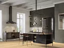 Wizualizacja czarnej kuchni, do której idealnie pasują panele podłogowe wodoodporne w kolorze Dąb Salem R174